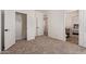 Carpeted bedroom features access to bath and walk-in closet at 2248 S Nikki Ln, Maricopa, AZ 85139