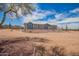 Single-story home featuring desert landscaping, seen from driveway with desert vegetation in background at 2248 S Nikki Ln, Maricopa, AZ 85139
