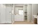 Sleek bathroom with walk-in shower, ample storage and modern fixtures at 25453 N 176Th Ave, Surprise, AZ 85387