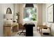 Stylish home office with modern desk, comfortable chairs, and natural light at 25453 N 176Th Ave, Surprise, AZ 85387