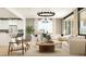 Bright living space features a plush sectional sofa, hardwood floors, and natural light at 25453 N 176Th Ave, Surprise, AZ 85387