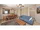 Comfortable living area with open layout and view of kitchen area, perfect for Gathering time and entertaining at 2614 W Fawn Dr, Phoenix, AZ 85041
