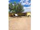 Large backyard area with a mature tree providing ample shade at 3041 E Osborn Rd, Phoenix, AZ 85016