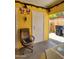 View of covered carport with room for a car and a comfortable office chair at 3041 E Osborn Rd, Phoenix, AZ 85016