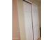White sliding closet doors leading to ample storage space at 3041 E Osborn Rd, Phoenix, AZ 85016