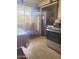 Spacious kitchen featuring stainless steel appliances and a window at 3041 E Osborn Rd, Phoenix, AZ 85016