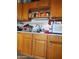 Classic kitchen with wooden cabinets and a white tile backsplash at 3041 E Osborn Rd, Phoenix, AZ 85016