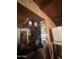 Cozy living room showcasing a unique wood-paneled design, vintage lanterns and decor at 313 E 15Th St, Tempe, AZ 85281