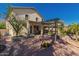 Exterior view of the home showcasing the paver patio and pergola at 3443 W Saint Anne Ave, Phoenix, AZ 85041