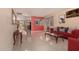 Bright living room with tile flooring, stylish furniture, and large windows at 3443 W Saint Anne Ave, Phoenix, AZ 85041