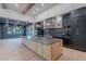 Beautiful kitchen with an expansive island, stainless steel appliances, and custom cabinetry at 3950 E Augusta Ave, Queen Creek, AZ 85142