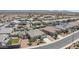 Aerial neighborhood view featuring manicured lawns, desert landscaping, and a mix of single-Gathering homes at 4001 N 300Th Ln, Buckeye, AZ 85396