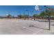 Spacious outdoor basketball court offers a great space for sports and recreation within the community at 4001 N 300Th Ln, Buckeye, AZ 85396