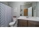 Bright bathroom featuring a shower with modern fixtures, neutral tones, and stylish decor at 4001 N 300Th Ln, Buckeye, AZ 85396