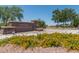 Welcoming entrance to Tartesso Community Park, surrounded by vibrant flowers and lush greenery at 4001 N 300Th Ln, Buckeye, AZ 85396