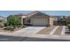 Charming one-story home with a two car garage and low maintenance desert landscaping at 4001 N 300Th Ln, Buckeye, AZ 85396