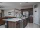 Contemporary kitchen with a center island, stainless steel appliances, and plenty of counter space at 4001 N 300Th Ln, Buckeye, AZ 85396