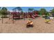 Extensive playground area equipped with multiple slides and climbing structures for active play at 4001 N 300Th Ln, Buckeye, AZ 85396