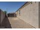 A spacious side yard features a fenced area and gravel groundcover at 4001 N 300Th Ln, Buckeye, AZ 85396