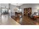 Inviting dining area featuring hardwood floors and stylish decor at 4118 W Fallen Leaf Ln, Glendale, AZ 85310