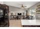 Bright, open kitchen with stainless steel appliances, and bar seating at 4118 W Fallen Leaf Ln, Glendale, AZ 85310