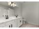 Modern bathroom with dual sinks and marble countertop at 4216 N Dania Ct, Litchfield Park, AZ 85340