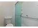 Bathroom with new shower with green frosted glass at 4216 N Dania Ct, Litchfield Park, AZ 85340