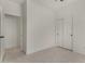 Bedroom with white paint, closet and neutral tile floor at 4216 N Dania Ct, Litchfield Park, AZ 85340