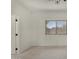 Bright bedroom featuring neutral paint and tile floors at 4216 N Dania Ct, Litchfield Park, AZ 85340