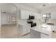 Well-appointed kitchen featuring white cabinets and stainless steel appliances at 4216 N Dania Ct, Litchfield Park, AZ 85340