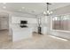 Modern kitchen with white cabinets, quartz countertops, and stainless steel appliances at 4216 N Dania Ct, Litchfield Park, AZ 85340