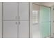 Bathroom with new shower and built-in linen cabinets at 4216 N Dania Ct, Litchfield Park, AZ 85340