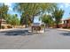 Pecos North neighborhood entrance sign, surrounded by lush landscaping, marking the entrance to the residential community at 4420 E Amberwood Dr, Phoenix, AZ 85048
