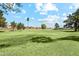 Expansive community greenspace offers a vast, well-maintained lawn perfect for recreational activities and community gatherings at 4420 E Amberwood Dr, Phoenix, AZ 85048