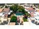Aerial view showing a fenced pool and outdoor lounge area surrounded by lush trees and landscaping at 4525 N 66Th St # 85, Scottsdale, AZ 85251