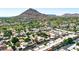 Stunning aerial view of the community, highlighting the lush landscaping and nearby mountain views at 4525 N 66Th St # 85, Scottsdale, AZ 85251
