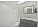 Bathroom featuring a modern vanity, shower, and toilet against light walls at 4525 N 66Th St # 85, Scottsdale, AZ 85251