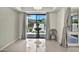 Dining area features beautiful tile flooring and large glass windows providing a view of the courtyard at 4525 N 66Th St # 85, Scottsdale, AZ 85251