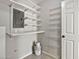 Utility room featuring shelving and a place to store supplies, with easy access at 4525 N 66Th St # 85, Scottsdale, AZ 85251