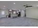 Open-concept kitchen with island seating and modern stainless steel appliances, perfect for entertaining at 542 E Flynn Ln, Phoenix, AZ 85012