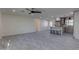 Open living space showcasing modern flooring and contemporary ceiling fan at 542 E Flynn Ln, Phoenix, AZ 85012