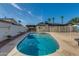 This fully fenced pool provides a secure and private oasis for relaxation and recreation at 542 E Flynn Ln, Phoenix, AZ 85012