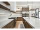 Gourmet kitchen features sleek countertops, modern appliances, ample storage, and a functional layout at 7001 E Joan De Arc Ave, Scottsdale, AZ 85254