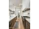 Well-equipped kitchen includes stainless steel appliances, modern cabinetry, and sleek countertops for easy cooking at 7001 E Joan De Arc Ave, Scottsdale, AZ 85254