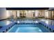 Beautiful pool and spa combination with sleek lounge chairs and inviting outdoor space at 7001 E Joan De Arc Ave, Scottsdale, AZ 85254