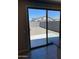 An enclosed backyard with gravel and a view of other homes at 7218 E Grouse Ct, San Tan Valley, AZ 85143