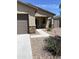 A close up front elevation with stacked stone accents on the columns of the front porch at 7218 E Grouse Ct, San Tan Valley, AZ 85143