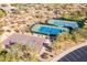 Aerial view of community tennis courts, basketball court, and convenient parking at 7438 E Visao Dr, Scottsdale, AZ 85266