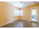 Bedroom with light orange walls, tile floors, and a white ceiling fan at 7438 E Visao Dr, Scottsdale, AZ 85266