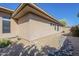 Exterior view of the home, showcasing desert landscaping and architecture at 7438 E Visao Dr, Scottsdale, AZ 85266